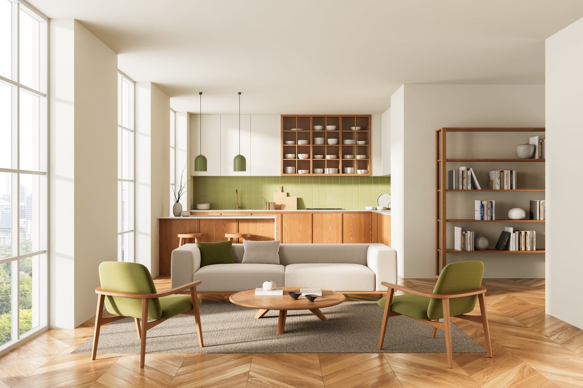 Calm, organized open-plan living room and kitchen with soft natural light